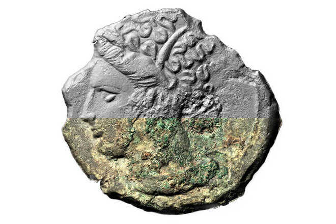 Greek coin – color camera examination in archaeology. image